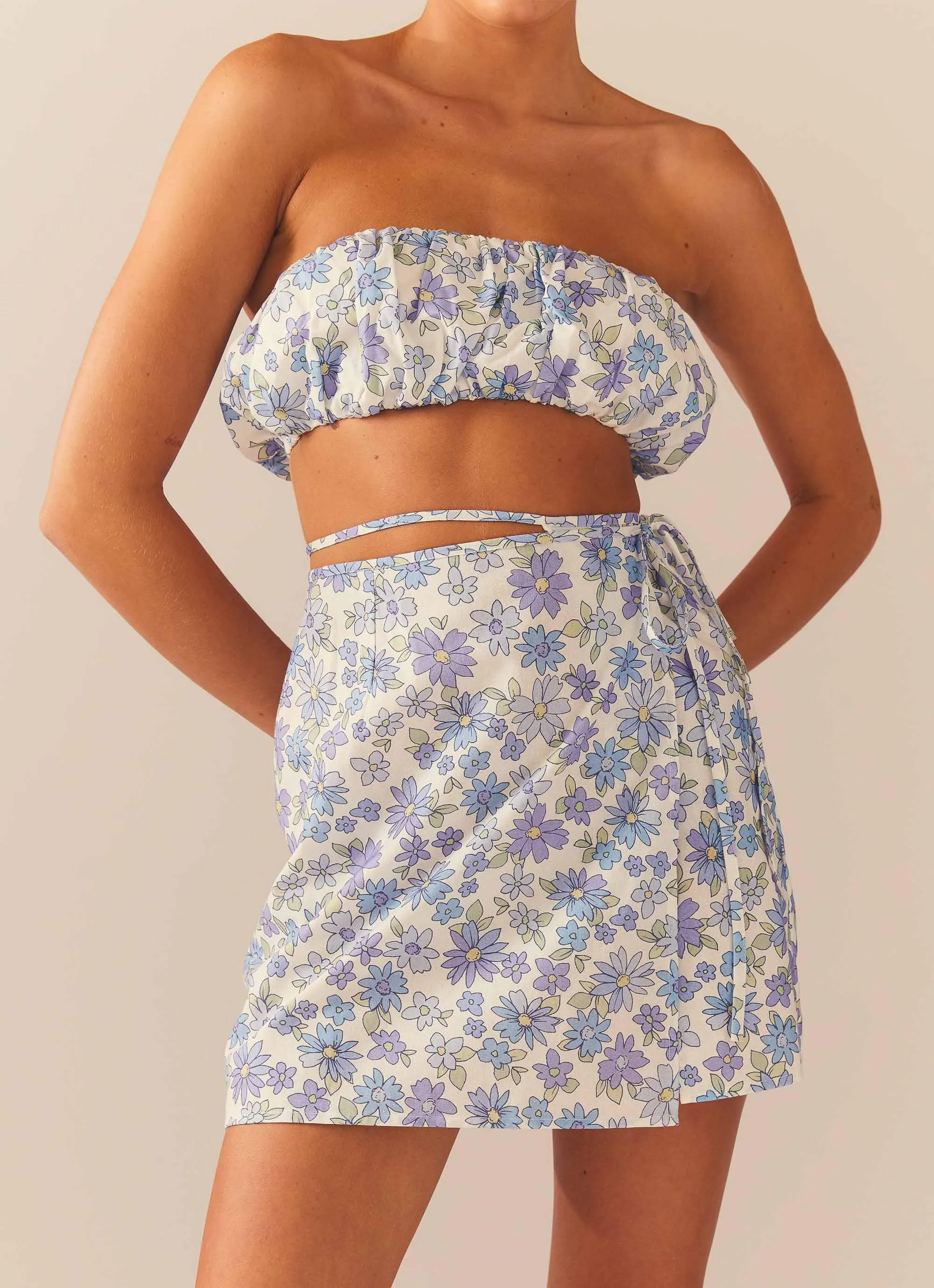 Longing For Less Mini Wrap Skirt - Daisy Chain