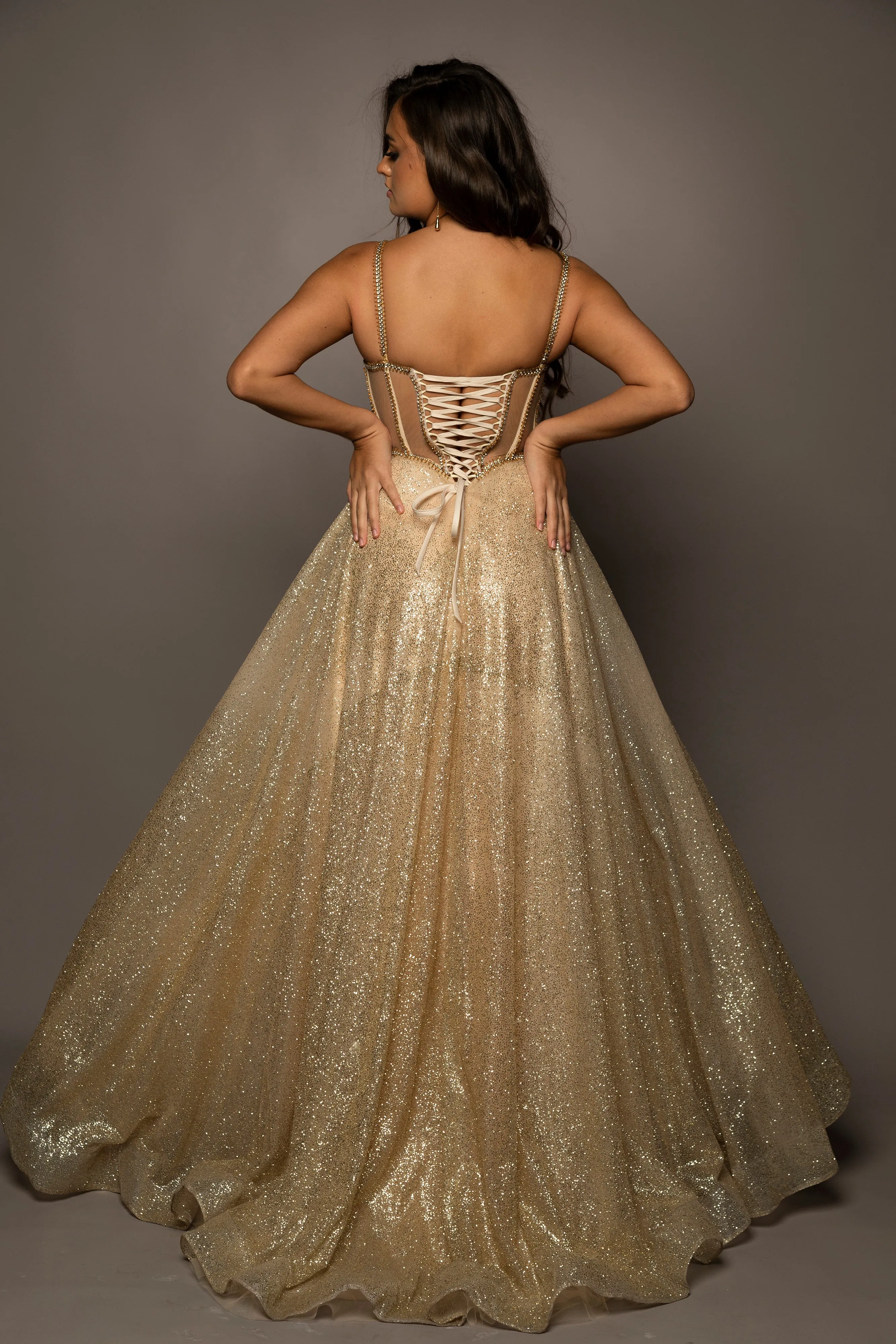 Sparkling gold bustier cup dress for hire